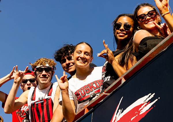 NIU students cheering at a Huskies home game